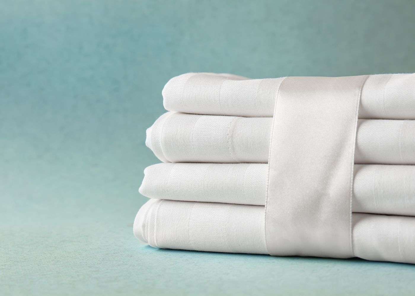 Pressed sheets tied with a ribbon